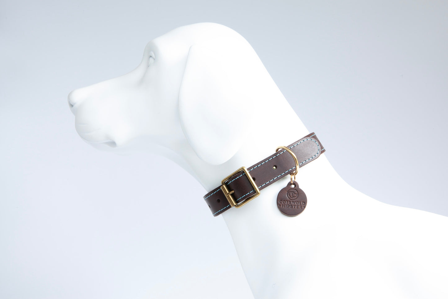 Chocolate Brown leather dog collar with Cornflower Blue felt lining and stitching, shown on large dog mannequin, handmade in the Cotswolds by Cotswold Hipster