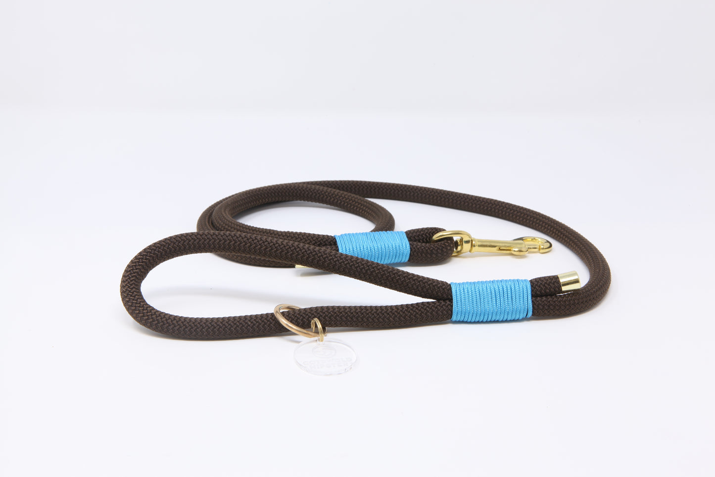 Dark brown and cornflower blue 10mm paracord rope dog lead with solid brass hardware and floating O-ring, handmade by Cotswold Hipster