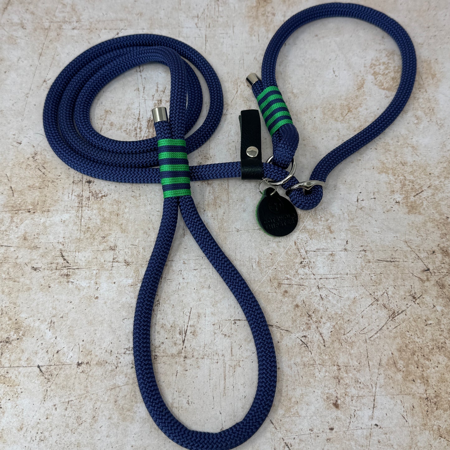 Handmade rope slip lead in French navy with bold emerald stripe detailing and nickel hardware from the Summer Fair Collection