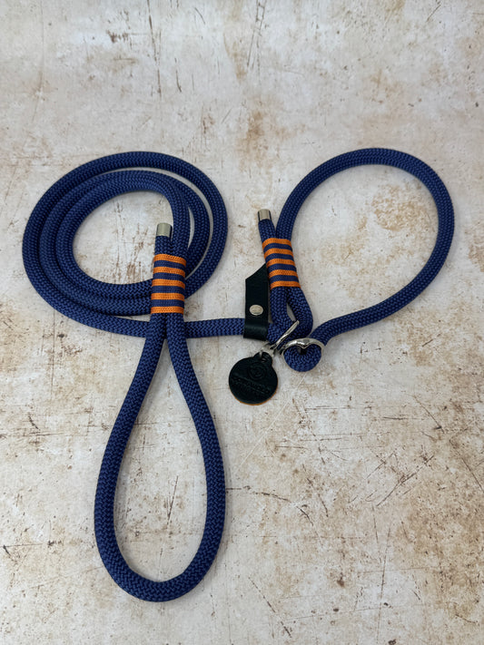 Handmade rope slip lead in French navy with bold tangerine stripe detailing and nickel hardware from the Summer Fair Collection