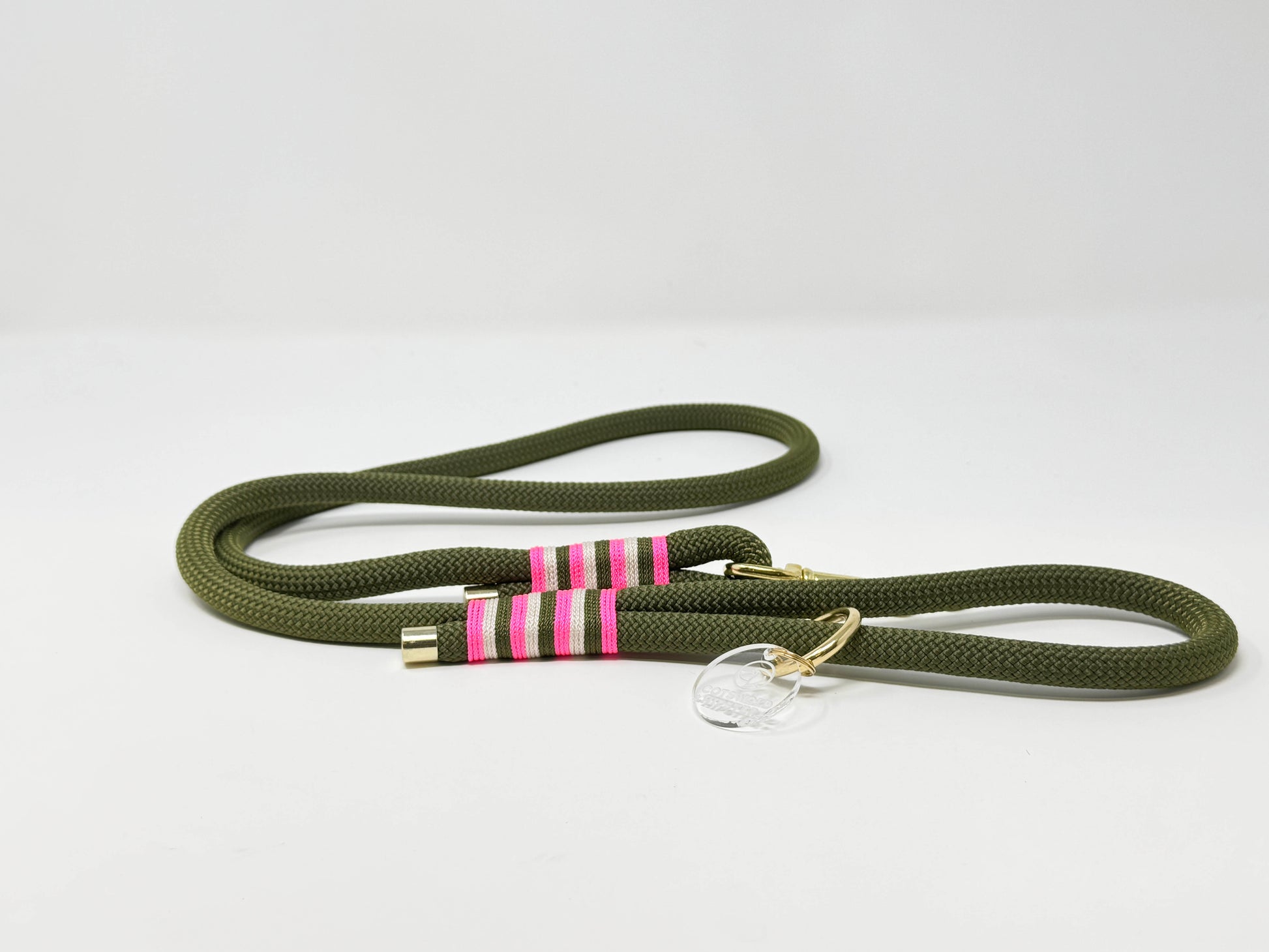 BE SEEN! Neon Pink rope lead for dogs, army green with cream and neon pink contrast whipping, solid brass hardware, high-visibility winter dog gear.