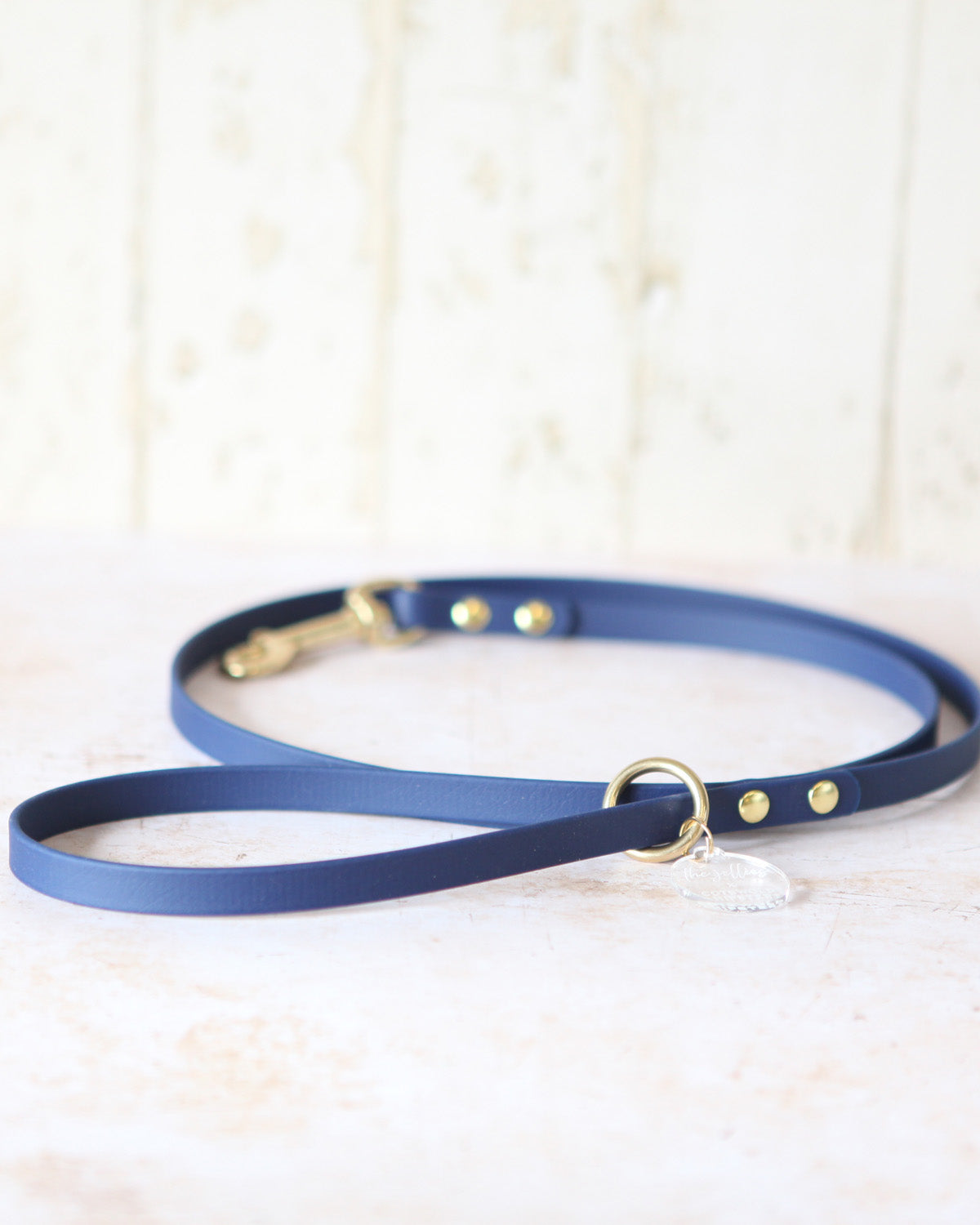 Small navy 12mm BioThane® dog lead with solid brass trigger clip and D-ring.