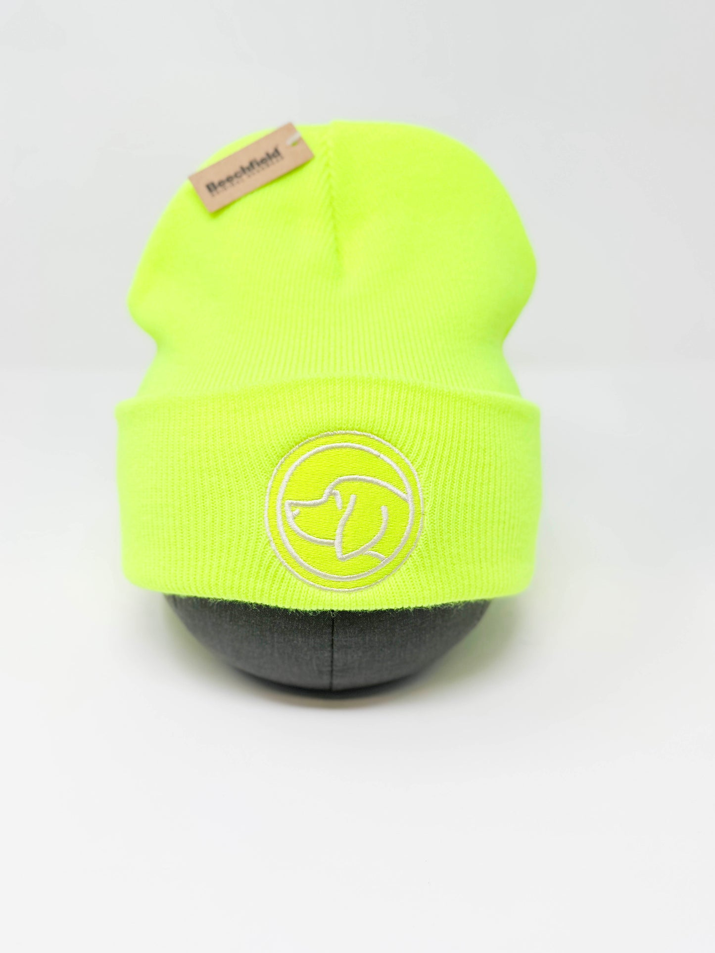 Neon yellow unisex beanie with dog head logo on a white background