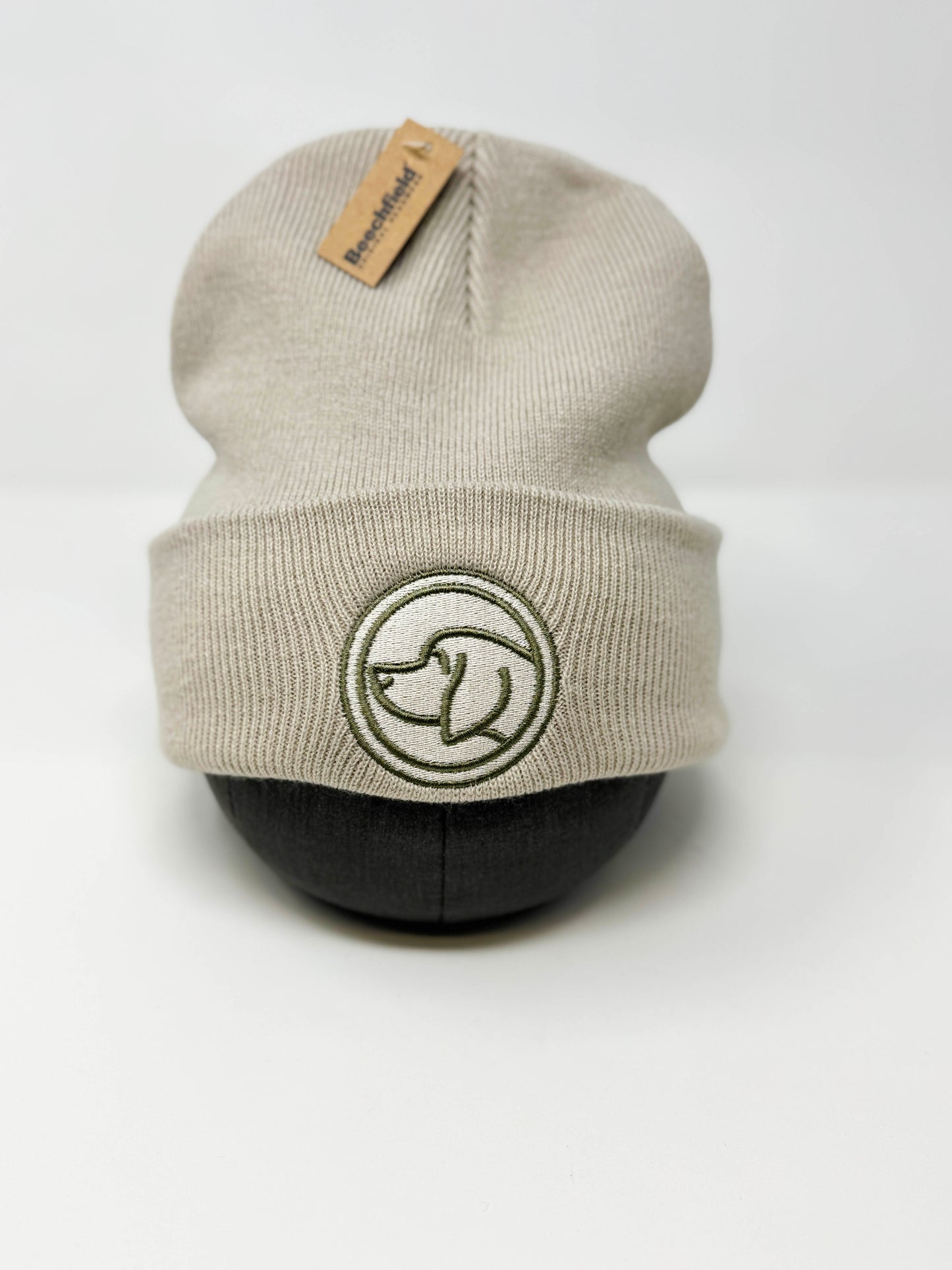 Stone unisex beanie hat branded with Cotswold Hipster dog logo, cozy winter hat for matching dog collars and leads.