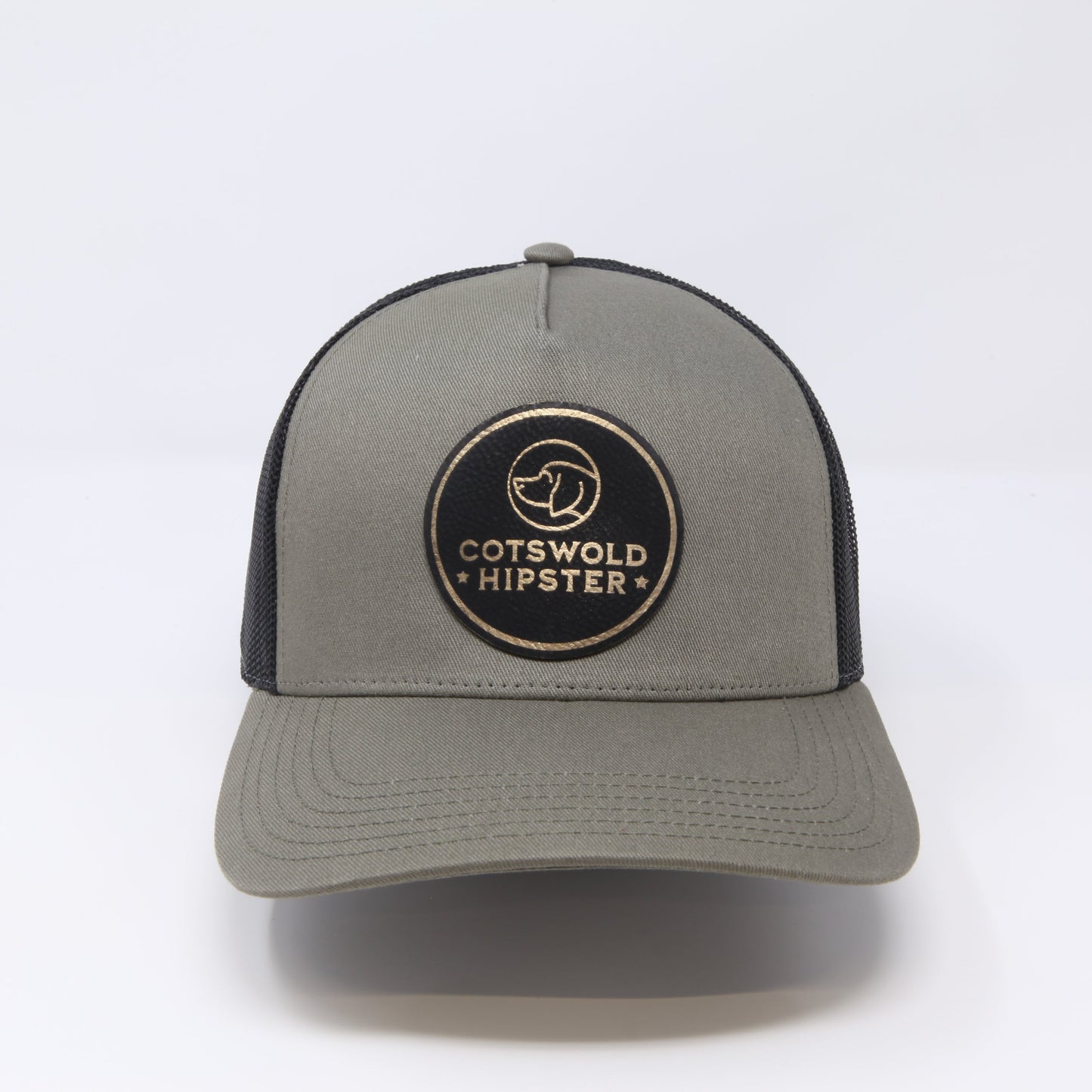 Front-facing khaki Field Cap on white background, displaying Cotswold Hipster logo and adjustable snap-back.
