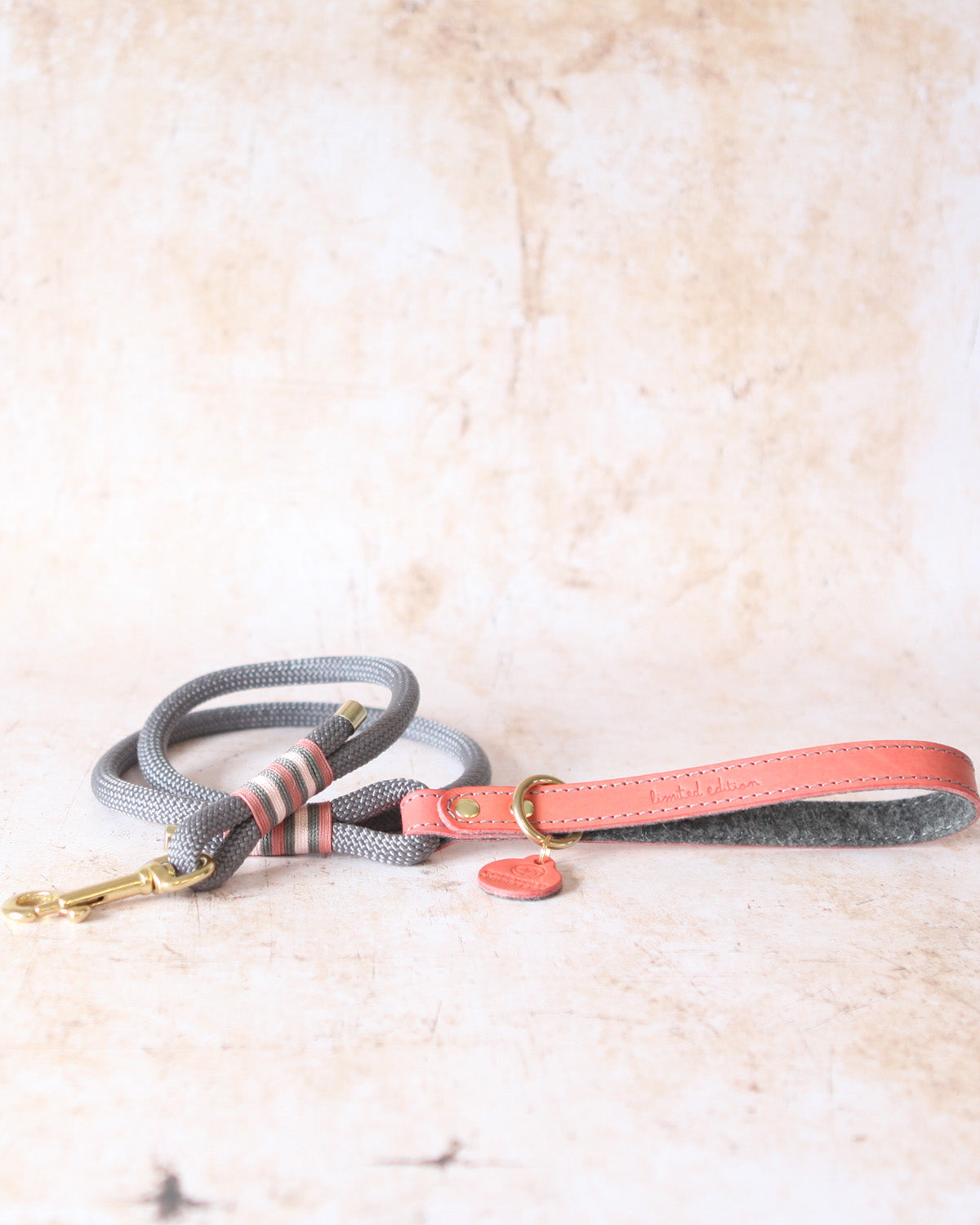 Charcoal rope dog lead with coral leather handle from the Coral & Charcoal Limited Edition collection, handcrafted in the Cotswolds.