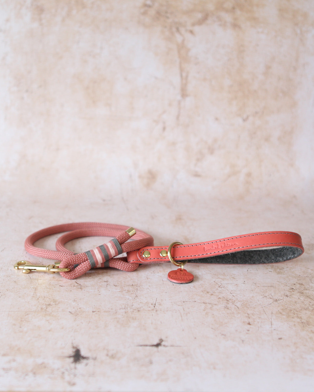 Coral rope dog lead with charcoal leather handle from the Coral & Charcoal Limited Edition collection, handcrafted in the Cotswolds.