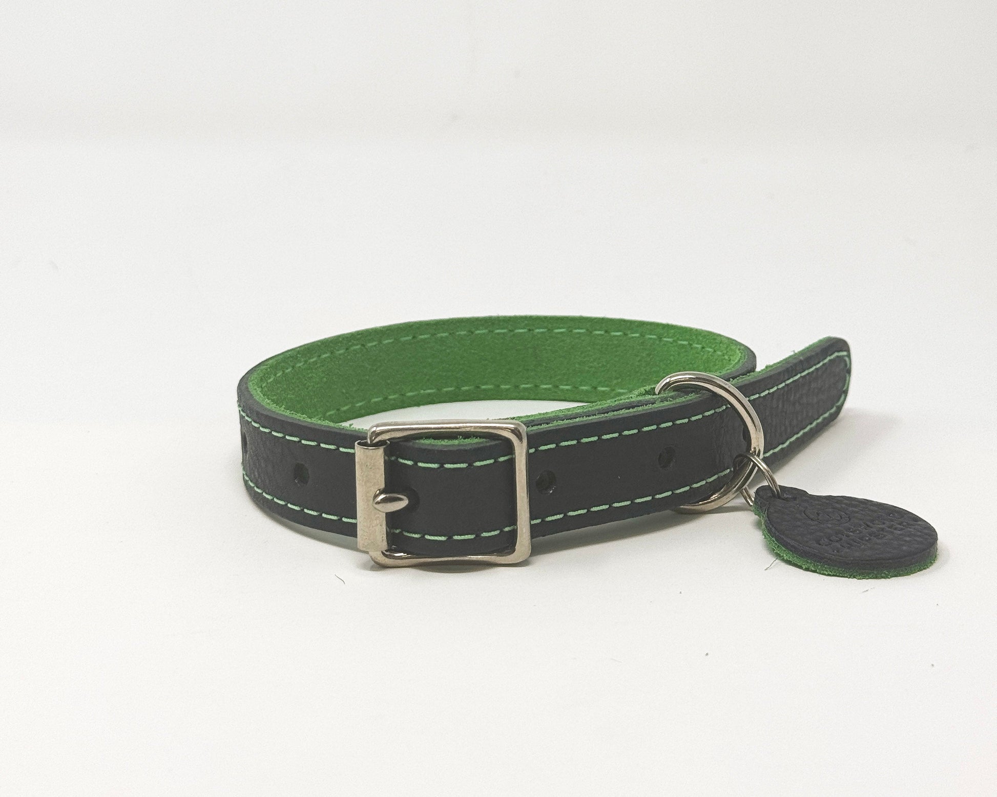 Medium handmade navy leather dog collar with emerald green suede backing from the Summer Fair Collection