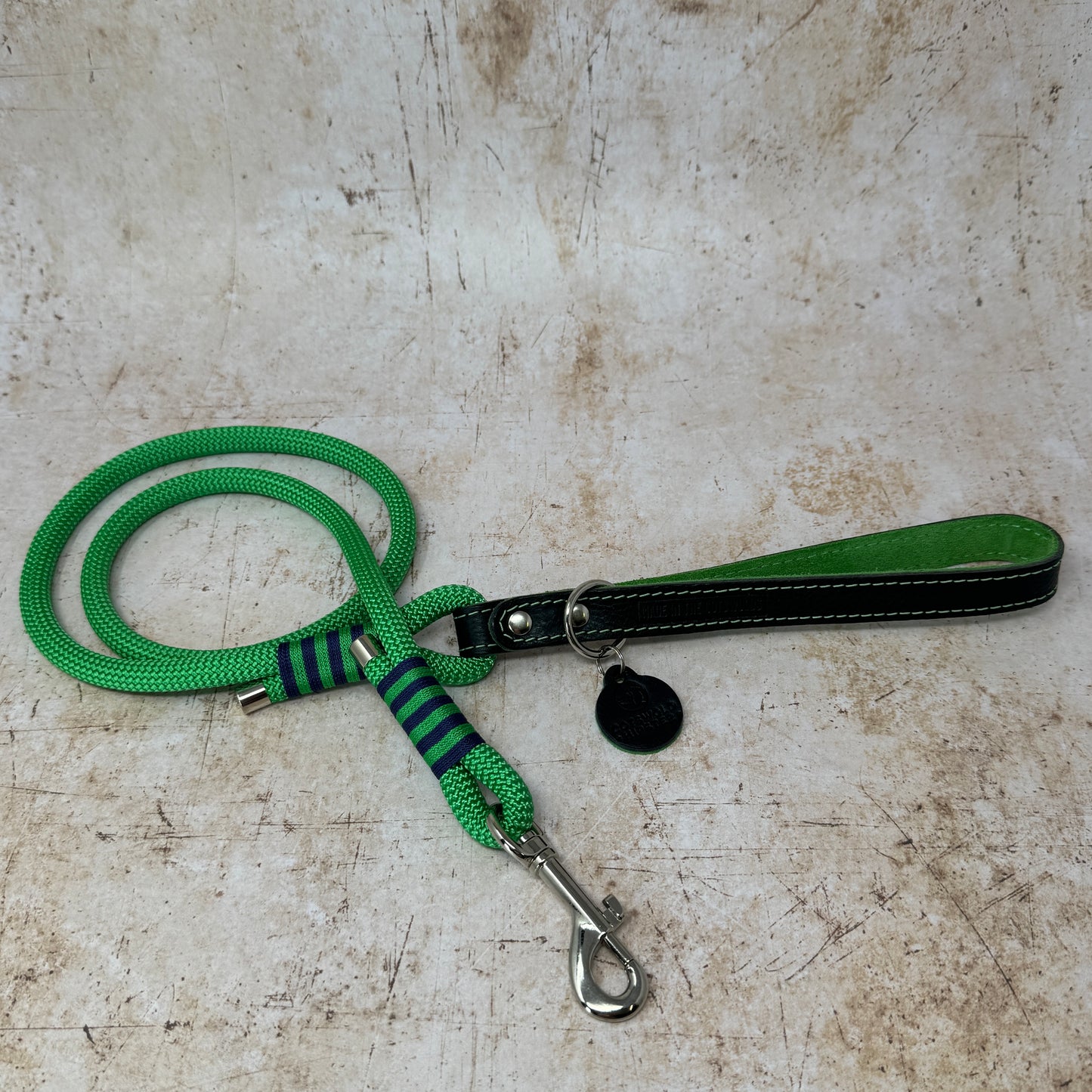 Handmade leather and rope dog lead with emerald rope, navy leather handle and emerald suede lining from the Summer Fair Collection
