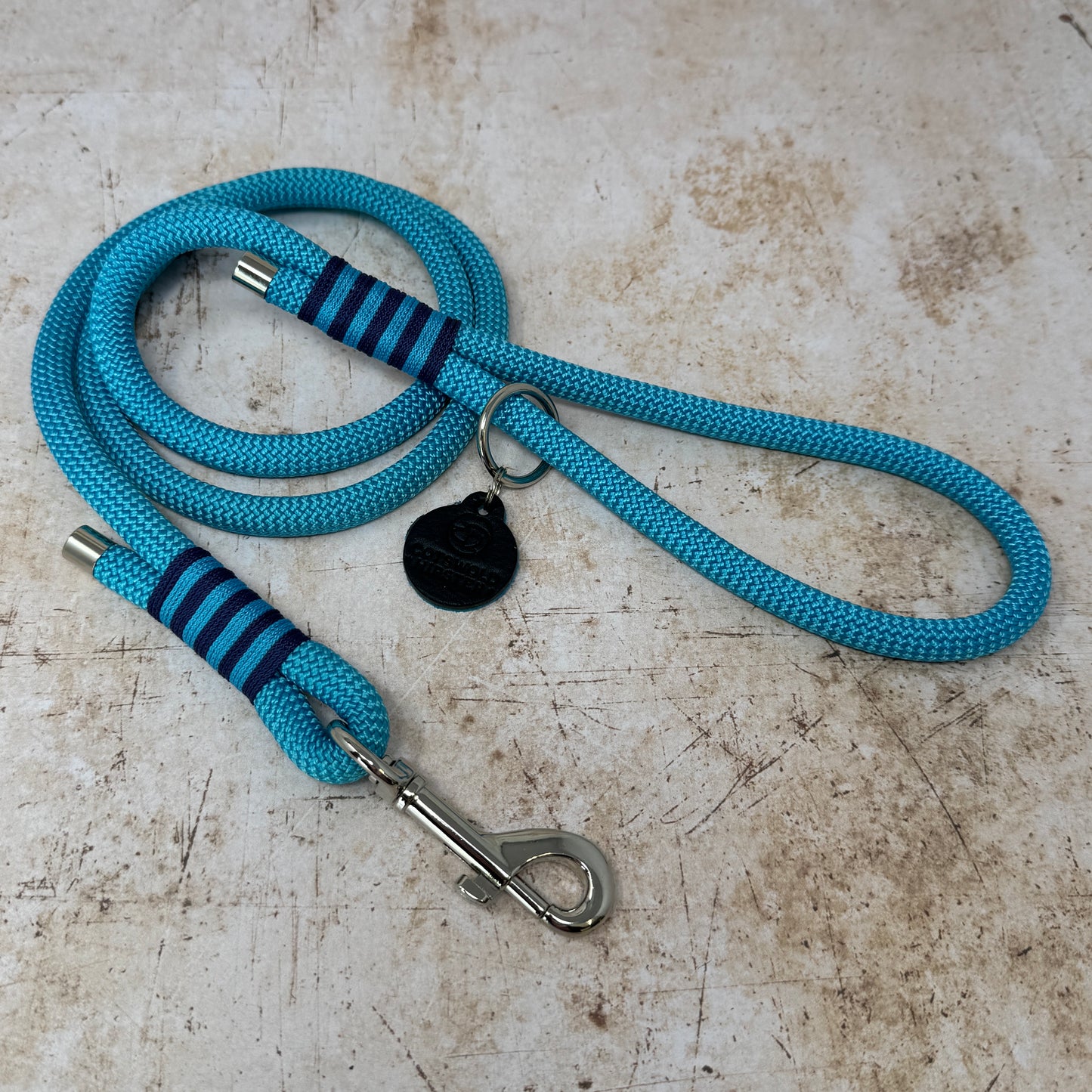 Summer Fair rope-handle dog lead in French navy with bold turquoise stripe detailing and nickel hardware