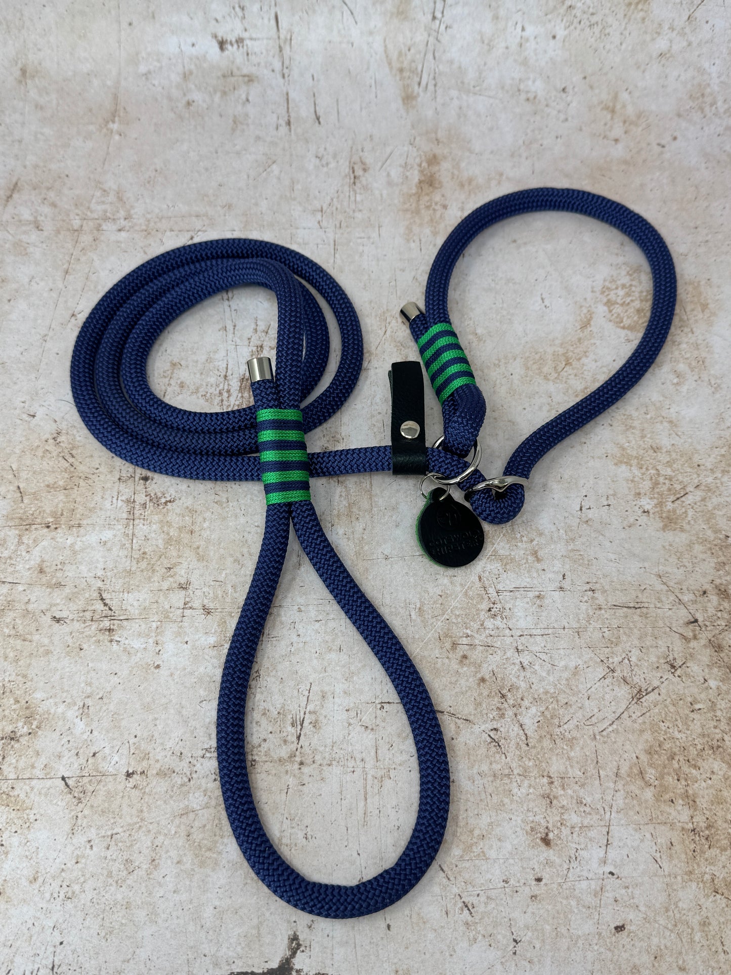 Handmade rope slip lead in French navy with bold emerald stripe detailing and nickel hardware from the Summer Fair Collection